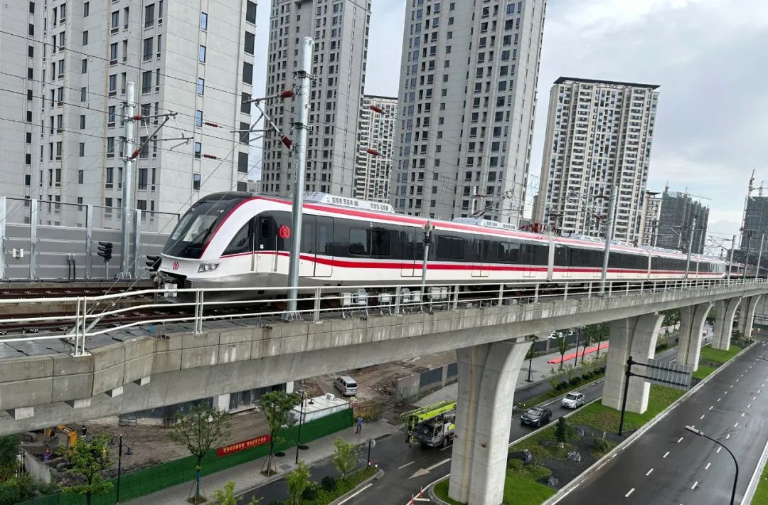 轨道交通S2线正式载客运营!8小时客流超12万人(图1) 3-230R9162015Y3.jpg